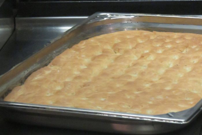 The final product - warm, crispy focaccia bread.