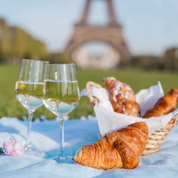 wine and croissants at the eiffel tower