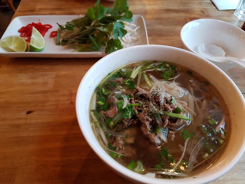 a bowl of beef pho