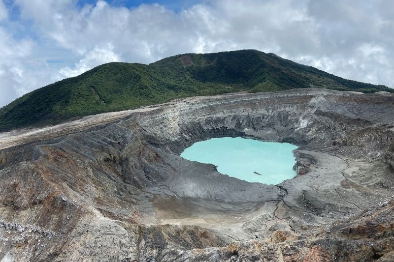 Poas Volcano blue lake in Costa Rica