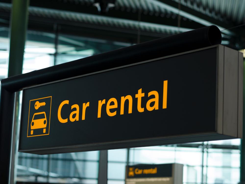 car rental sign in an airport