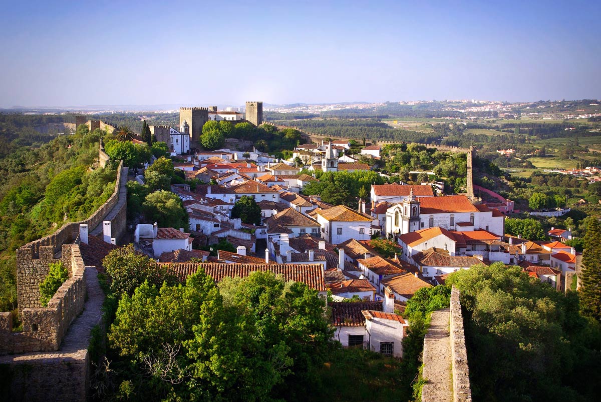 9 Small European Towns with Astonishing Histories to Explore 4 Obidos, Portugal