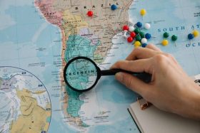 map with magnifying glass over Argentina