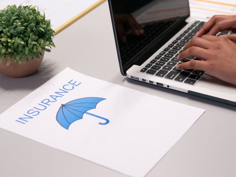 paper on a desk saying Insurance
